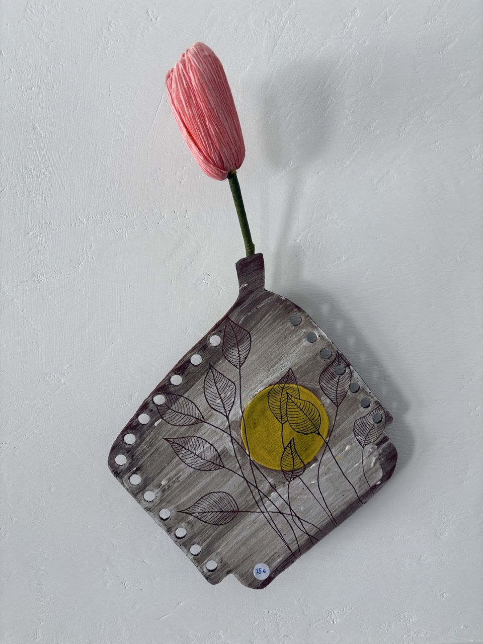 Vaso-fiori-parete-sole
