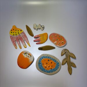 Spille per vestiti in ceramica